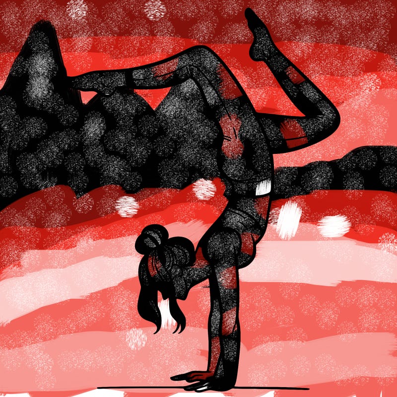 a woman doing a handstand