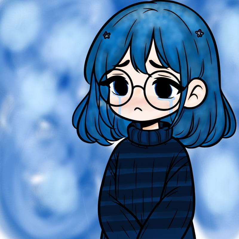 sad girl with glasses in a sweater