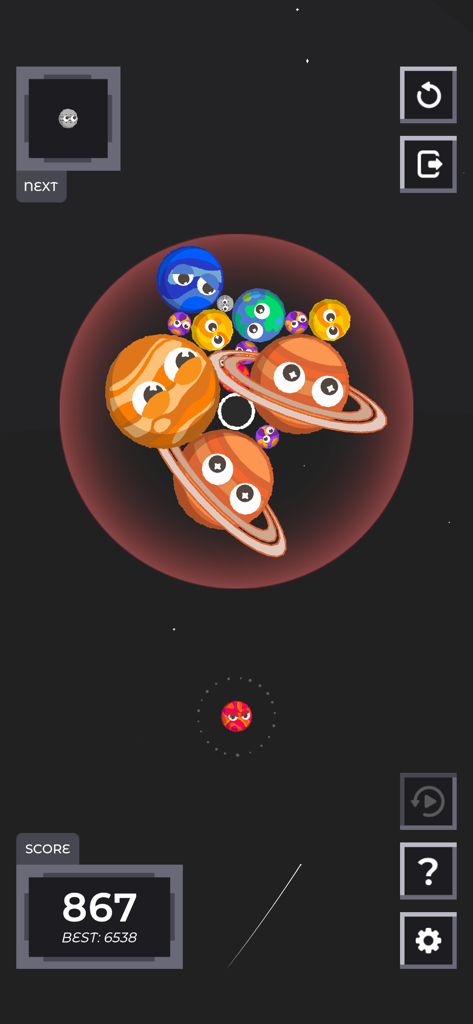 Sputnika Game gameplay showing cute smiling planets merging in a cosmic gravity field