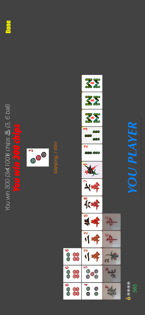 Una mano vincente in Pinoy Mahjong che mostra le tessere e le chip vinte