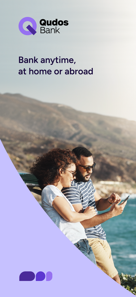Qudos Bank - A couple using the Qudos Bank app on a smartphone while traveling.
