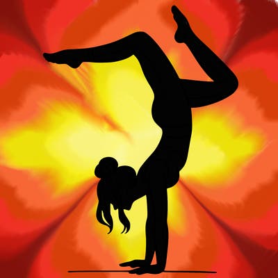 a woman doing a handstand