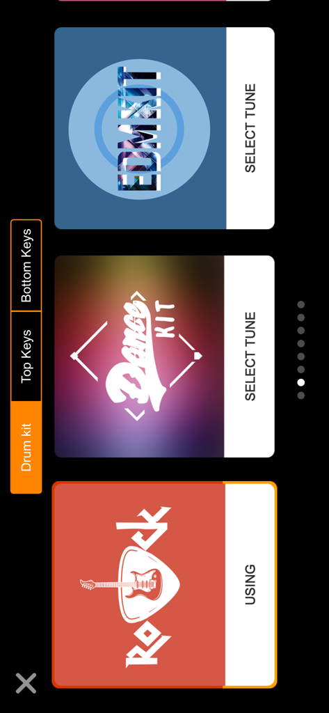 X Drum app menu showing options to select EDM, Dance, and Rock drum kits