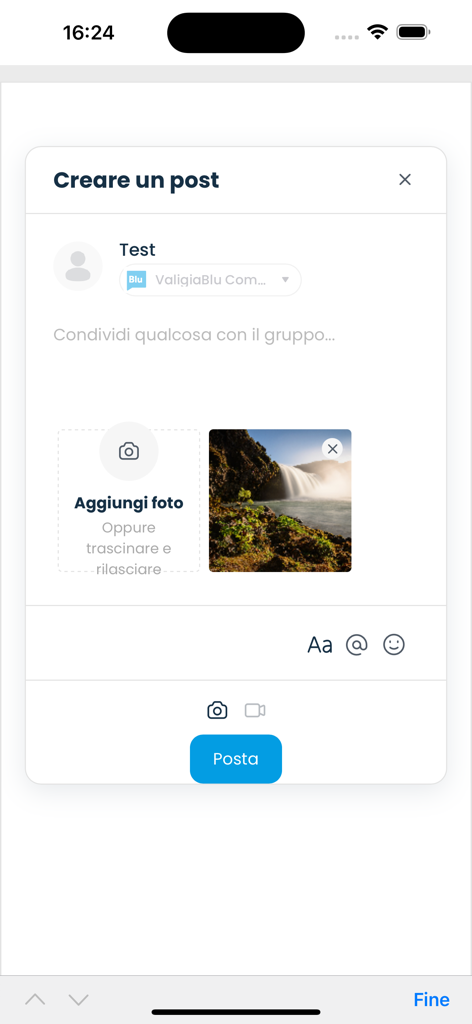 Valigia Blu Community - Interface of the Valigia Blu Community app showing the creation of a new post with a text field and an attached photo of a waterfall