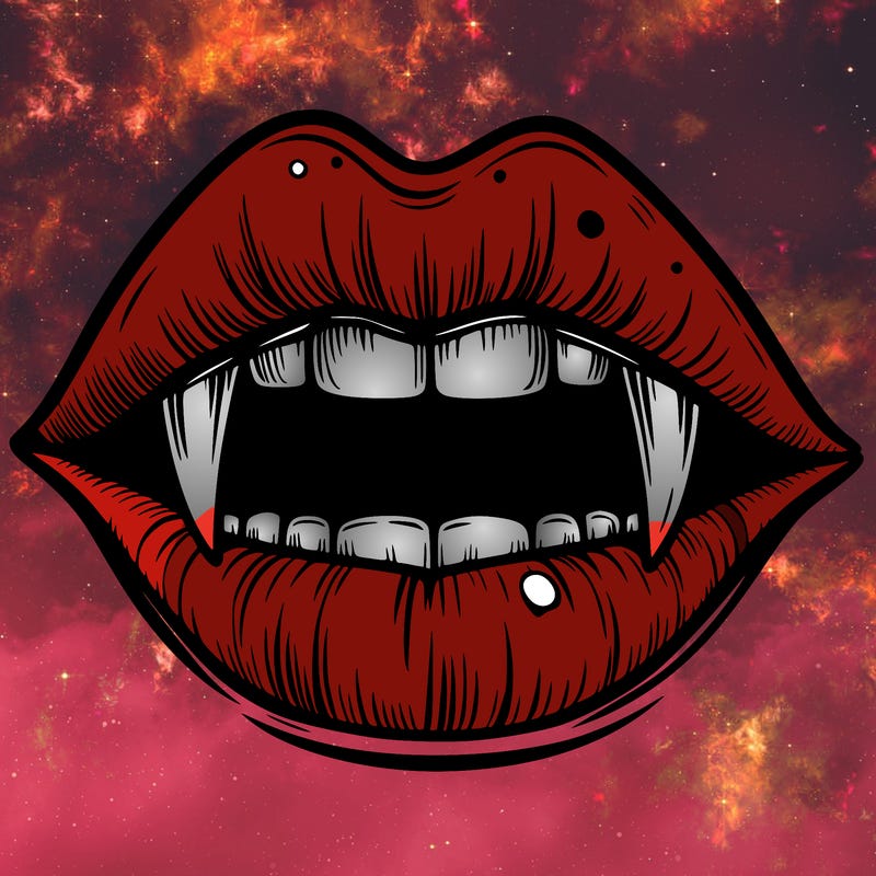 lips with vampire teeth