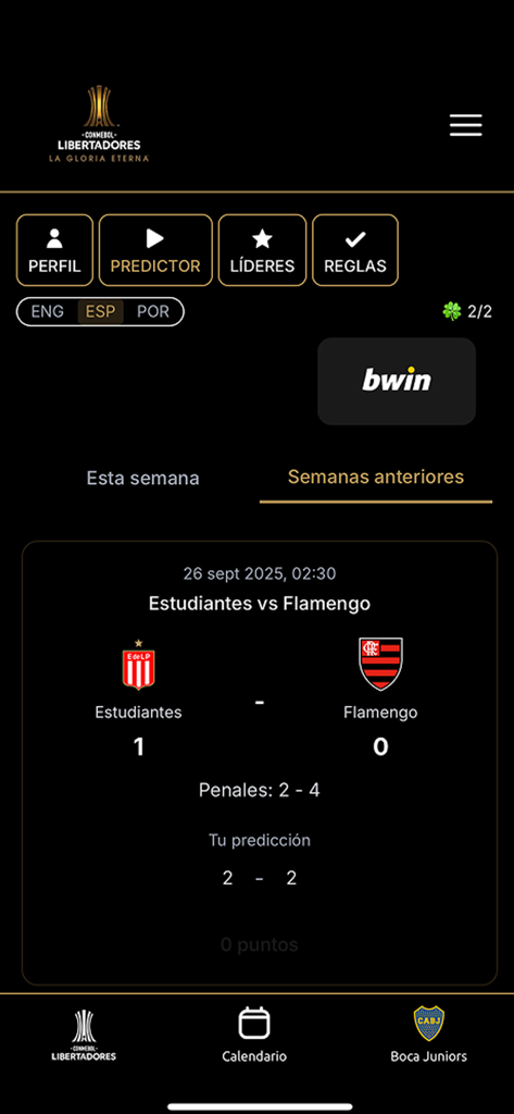 CONMEBOL Libertadores - Captura de pantalla de la aplicación CONMEBOL Libertadores que muestra los resultados de partidos de fútbol y la función de predicción de resultados.