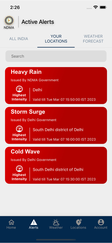 Sachet app screen displaying active disaster alerts for heavy rain and storm surge in Delhi