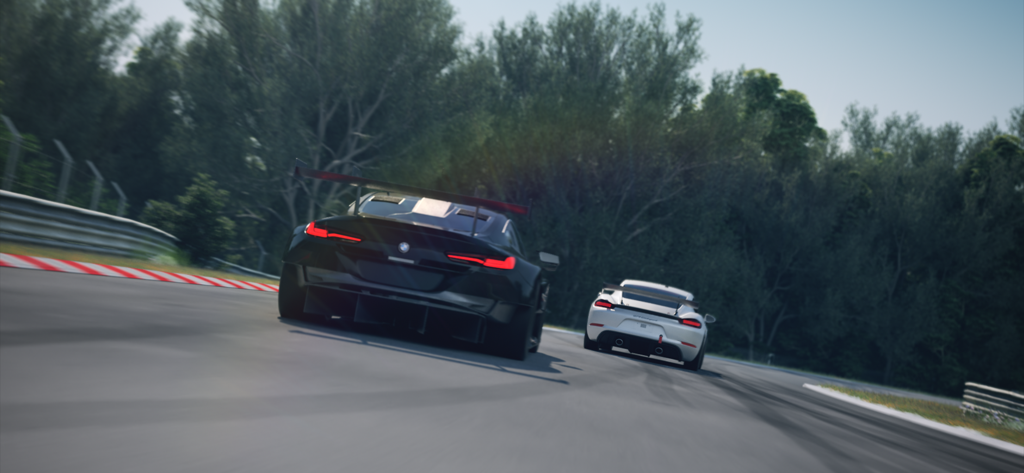 Top Drives - Car Race Battles - Two high performance sports cars racing on a track with green trees in the background