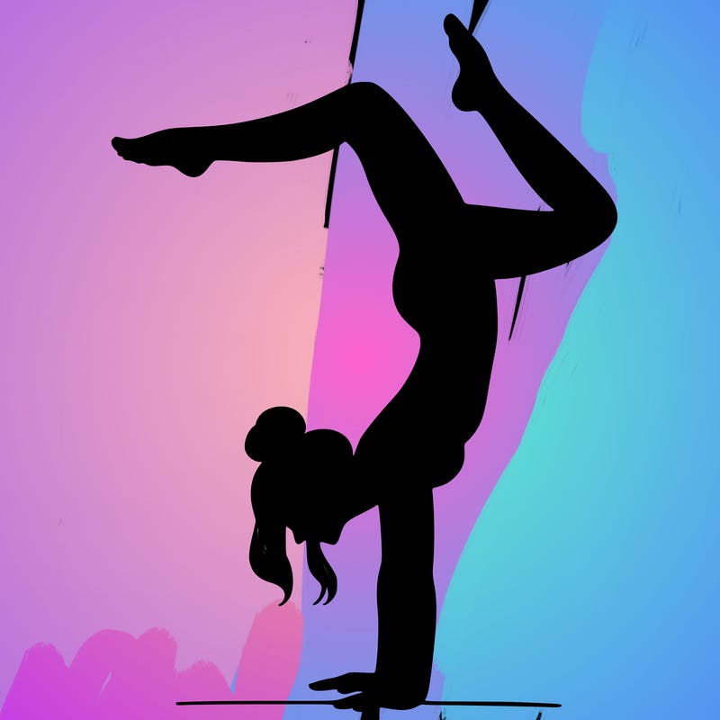 a woman doing a handstand