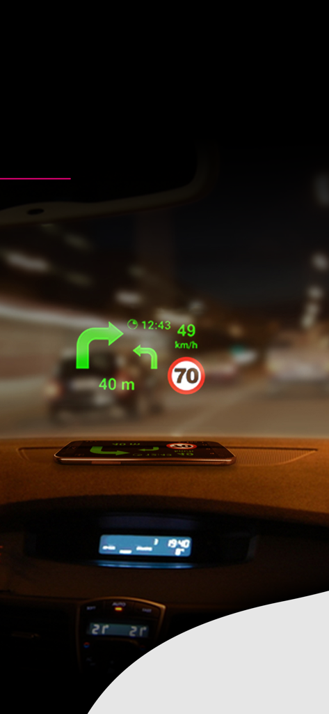 Aplicación de navegación Nawigacja T-Mobile en modo Head-Up Display proyectando direcciones en el parabrisas de un coche por la noche
