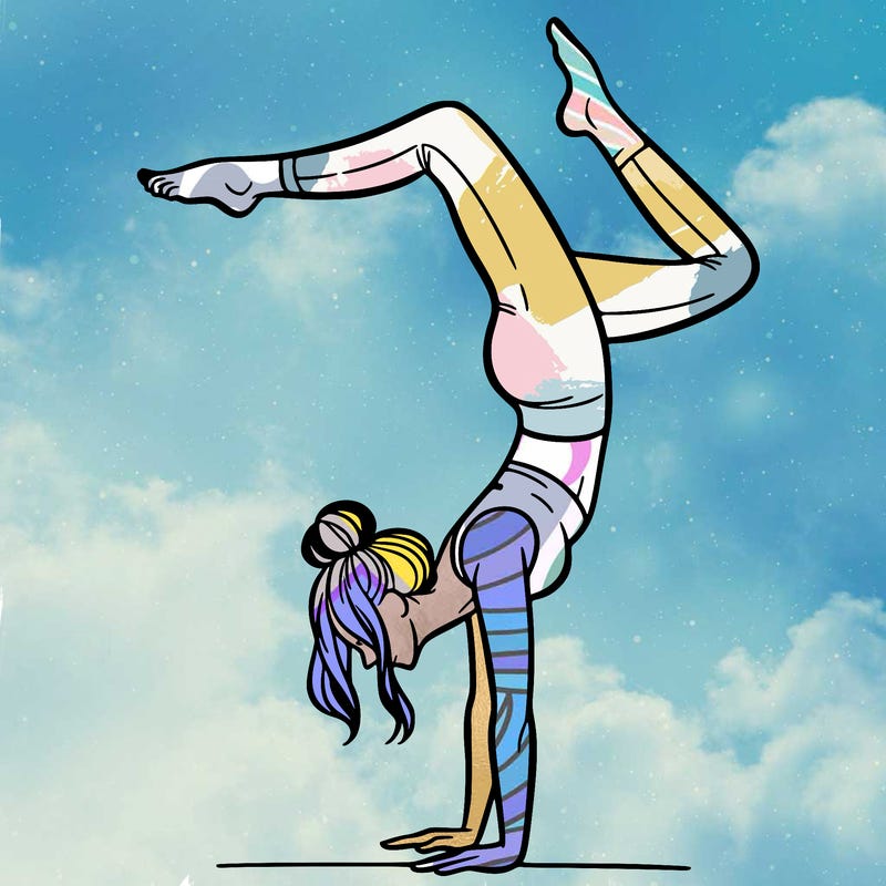 a woman doing a handstand