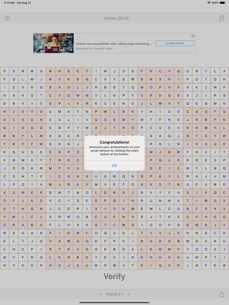 Sudoku 25x25 - お祝いのポップアップメッセージが表示された iPad 上の完成した 25x25 数独グリッド