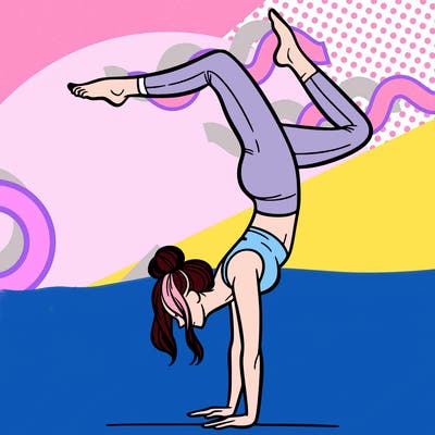 a woman doing a handstand