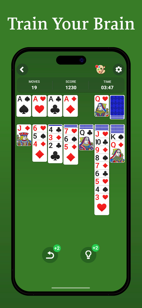 A classic Solitaire card game interface on a smartphone screen with the text Train Your Brain above it