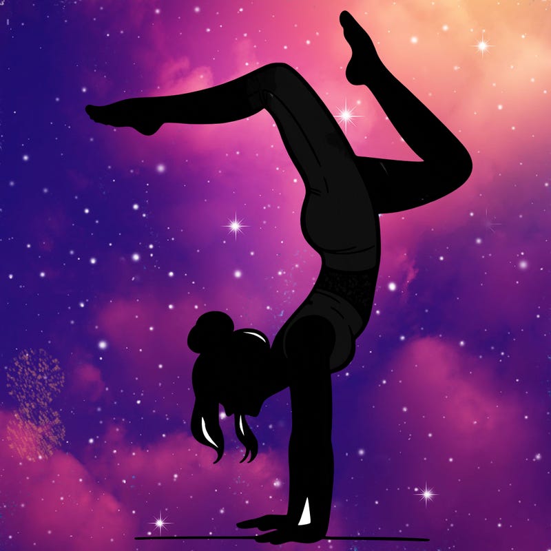 a woman doing a handstand