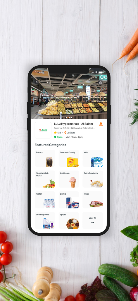 Karrot App - Karrot app interface showing grocery categories like bakery and snacks for a local supermarket