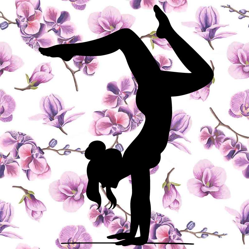 a woman doing a handstand