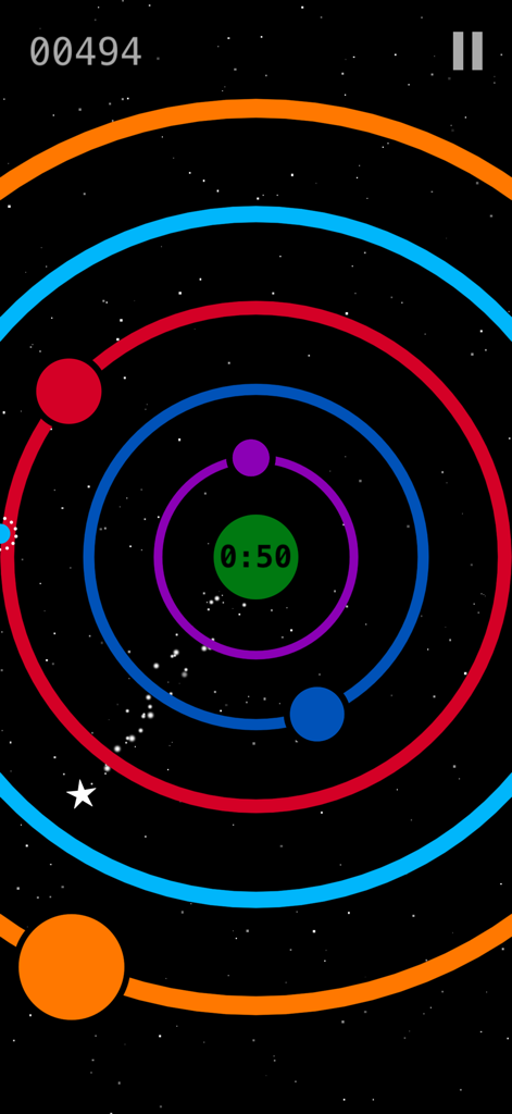 Ring Rush - Pop 'Til You Drop! - Gameplay screenshot of Ring Rush showing colorful rings and a star on a starfield background