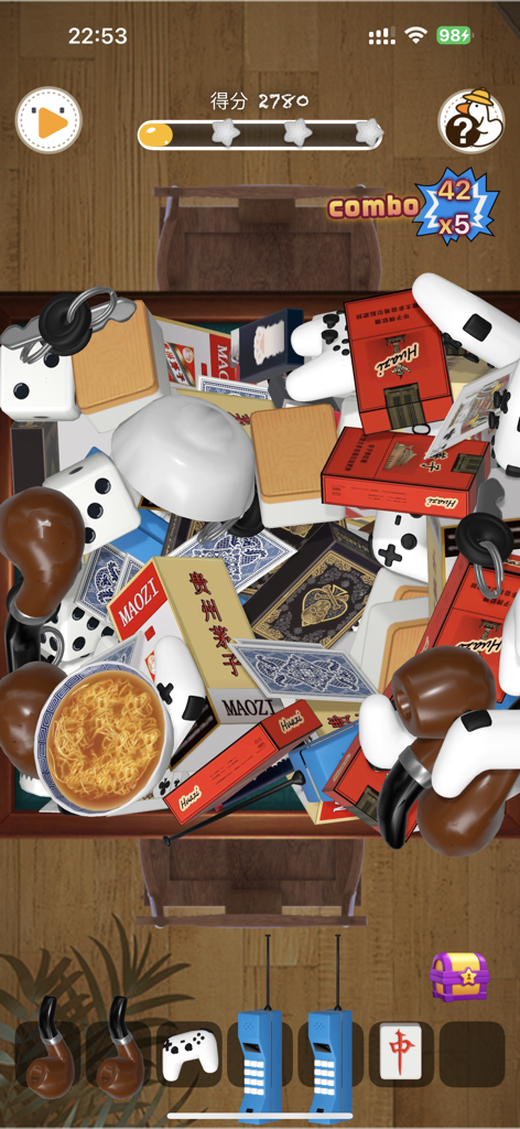 TallDaEr - TallDaEr mobile game interface showing a pile of various 3D objects like dice and game controllers for a matching puzzle