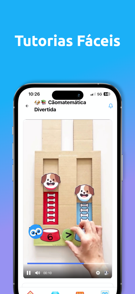 Pedagoteca - A video tutorial in the Pedagoteca app showing a fun dog-themed math activity for kids using cardboard crafts.