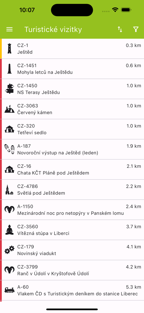 Wander Book - Wander Book app interface showing a list of nearby tourist stickers with icons and distances.