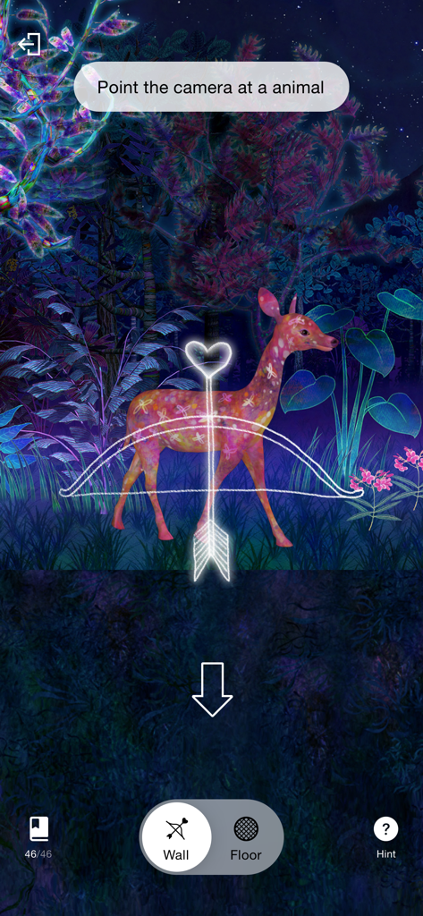 AR interface of the Collecting Forest app showing a digital deer being targeted for capture in a stylized forest