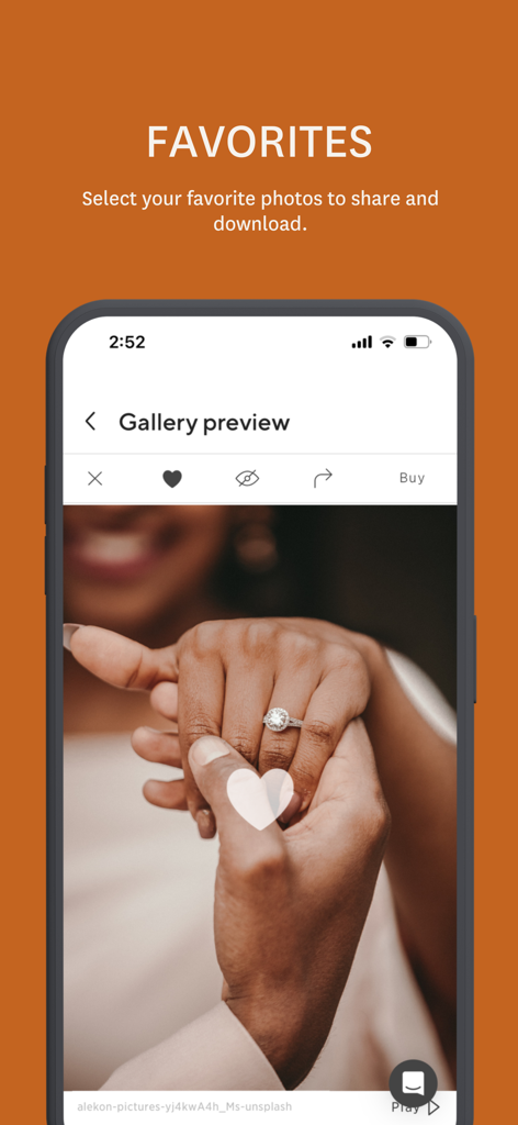 A smartphone screen displaying a favorited engagement ring photo in the Pass Gallery and Store app