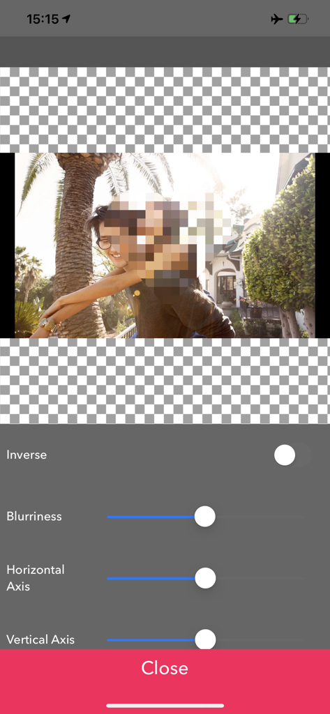 MovStash - Blur Video Editor - MovStash app interface showing a mosaic blur effect applied to a face with sliders for blurriness and axis adjustments