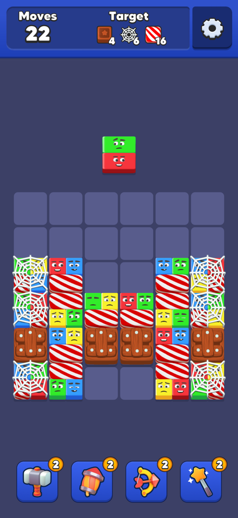 Gameplay screenshot of Drop Jelly showing colorful blocks with faces on a grid and puzzle power ups