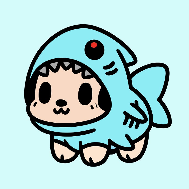 cute dog wearing a shark costume