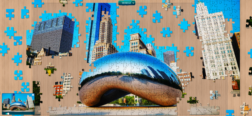 Cool Jigsaw Puzzle HD - Digital jigsaw puzzle of Chicago city landmarks being assembled in the app
