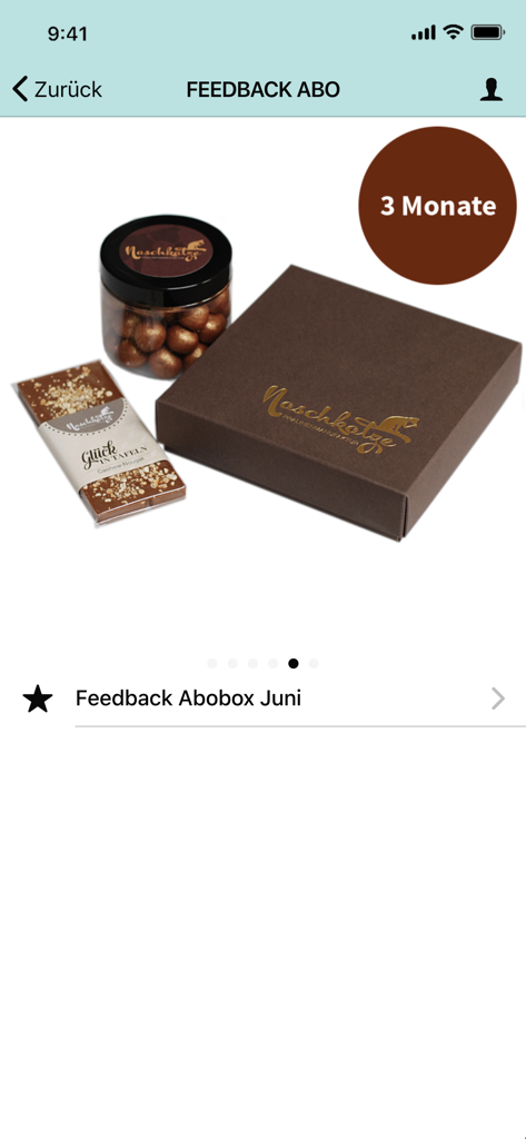 Eine Luxus-Schokoladen-Abonnementbox mit handgefertigten Pralinen und einer Schokoladentafel