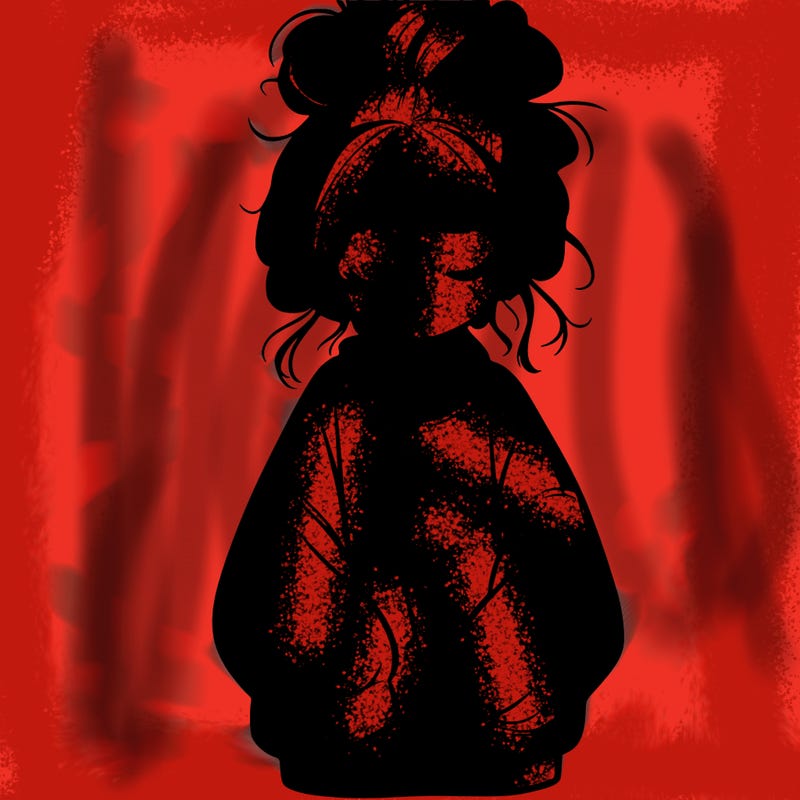 girl with baggy sweatshirt and messy bun