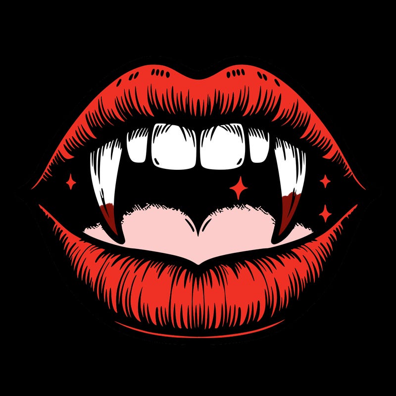 lips with vampire teeth