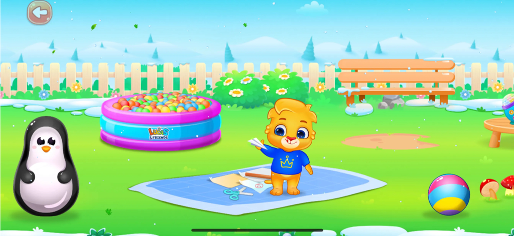 A colorful outdoor park scene from Baby Games featuring a cartoon character, a ball pit, and a penguin figure.