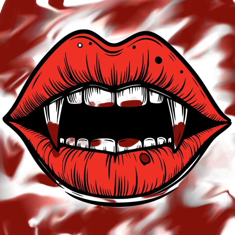 lips with vampire teeth