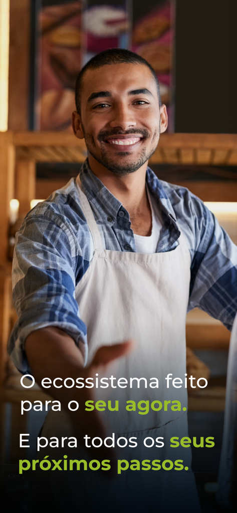 A smiling entrepreneur in an apron representing the vhsys business management ecosystem