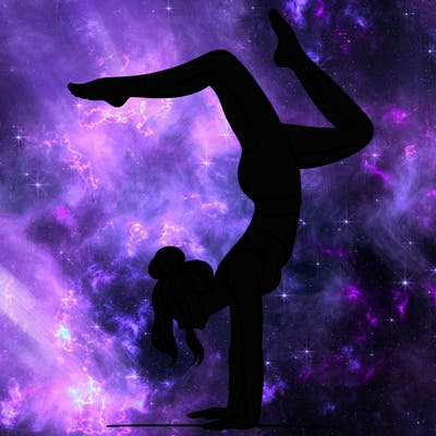 a woman doing a handstand