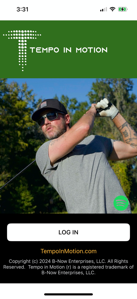 Login screen for the Tempo In Motion golf app featuring a golfer in mid-swing and a Spotify integration icon