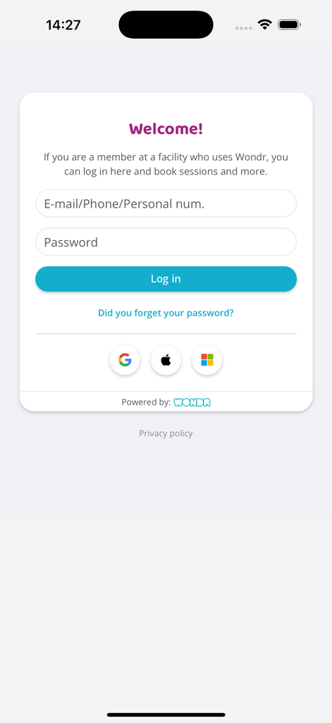 Wondr booking app - The login interface for the Wondr booking app featuring email and password fields alongside social login options.