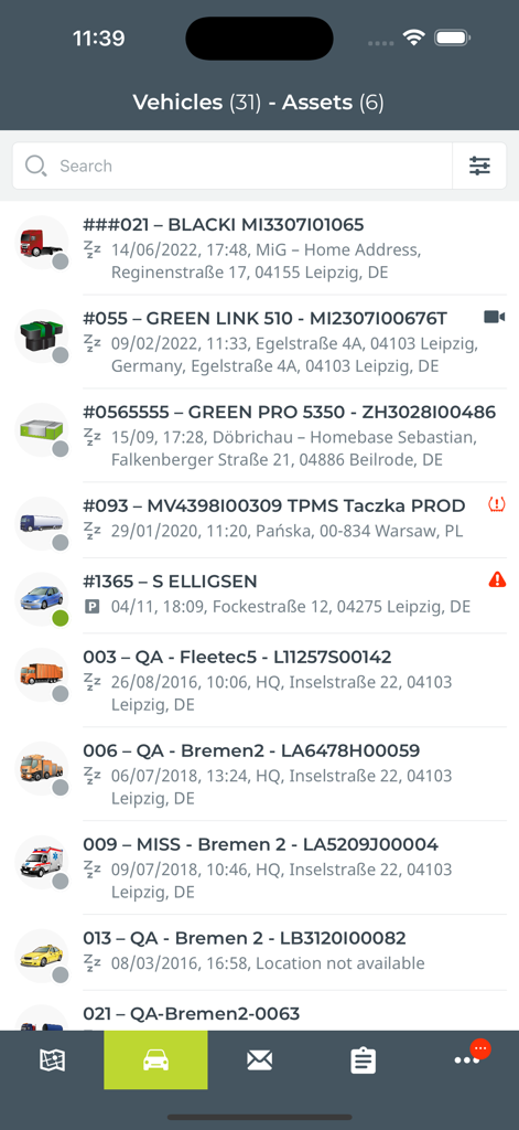 Webfleet Mobile - Webfleet Mobile app interface showing a list of tracked vehicles and assets with status updates and locations