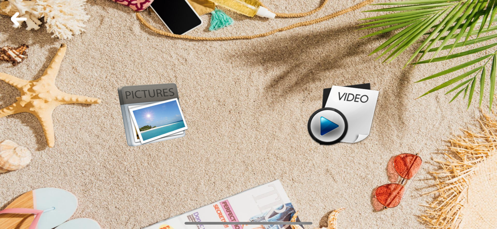RC UFO - RC UFO app media selection screen showing pictures and video icons on a beach sand background