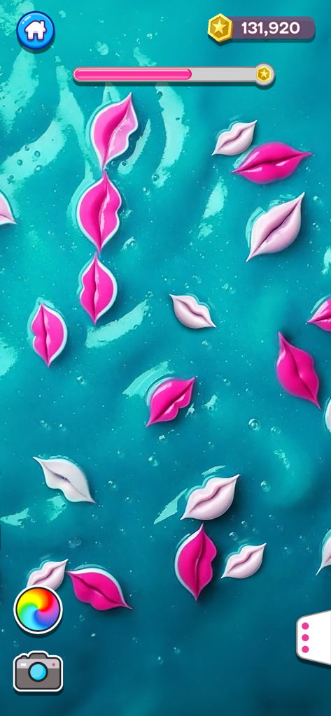 Türkiser digitaler Schleim mit rosa und weißen lippenförmigen Dekorationen in der Super Slime Simulator App