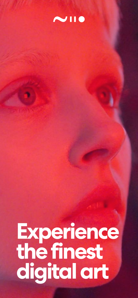Niio Art app display showing a close up face in red light with text experience the finest digital art