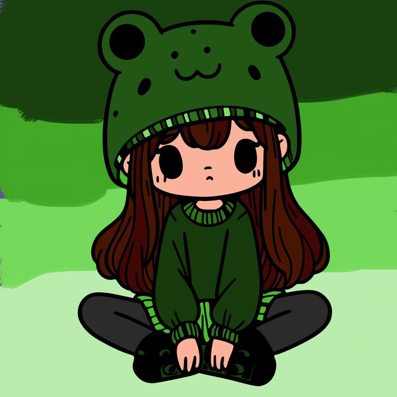 a girl wearing a frog hat and some frog socks