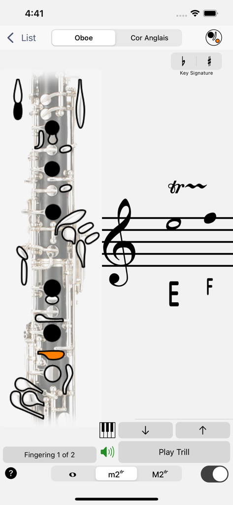 Fingering Woodwinds for iPhone - App interface displaying oboe trill fingering with musical staff notation