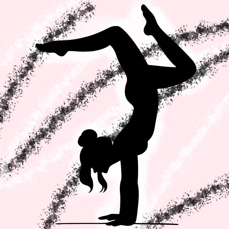 a woman doing a handstand