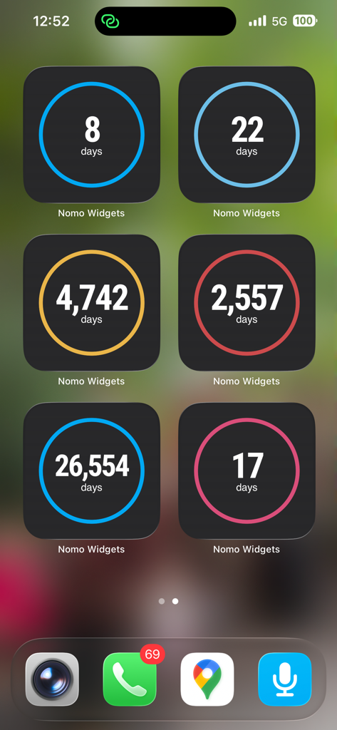 Nomo Widgets - iPhone home screen displaying several Nomo sobriety widgets with colored daily progress counters.