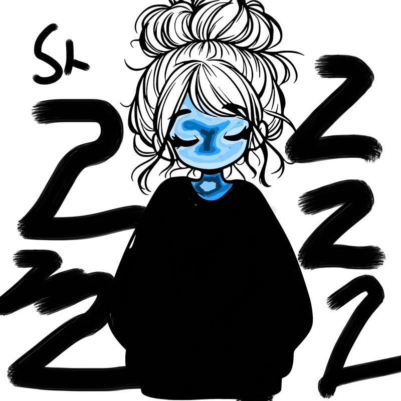 girl with baggy sweatshirt and messy bun