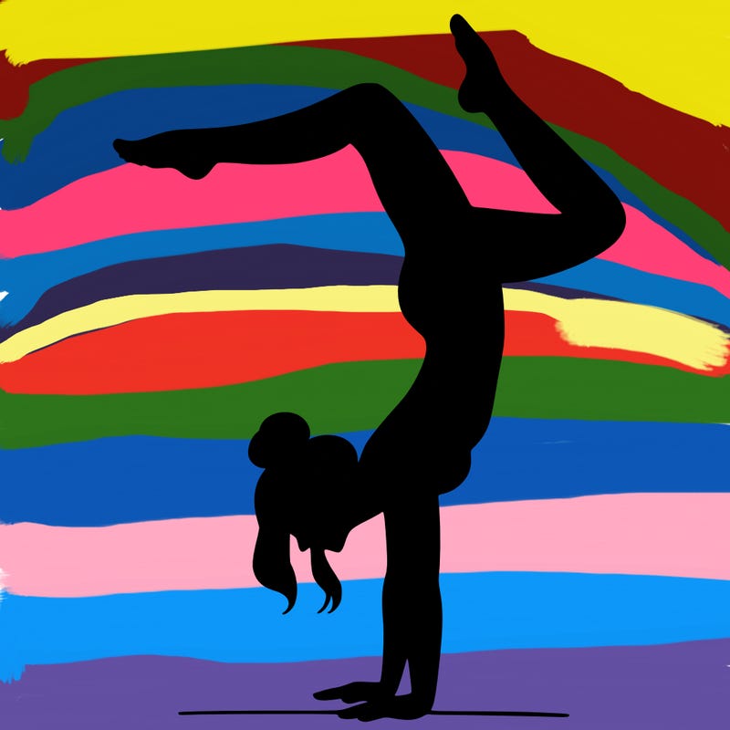 a woman doing a handstand